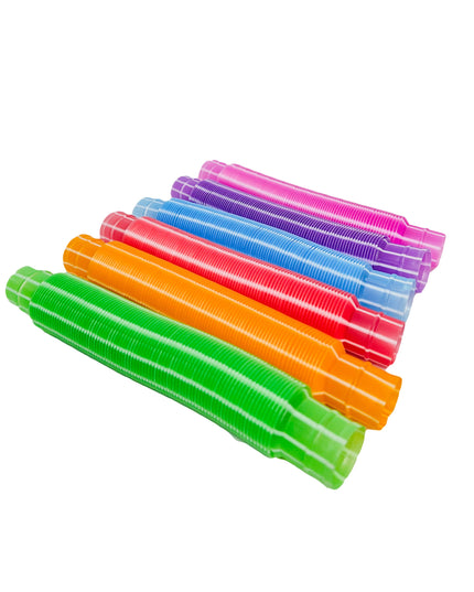 A pink fidget pop-it tube with a ribbed texture.