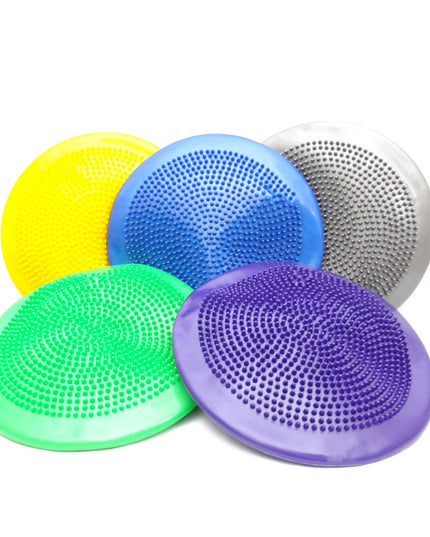 A collection of inflatable air cushions in various solid colors, each covered with raised nodules for grip.