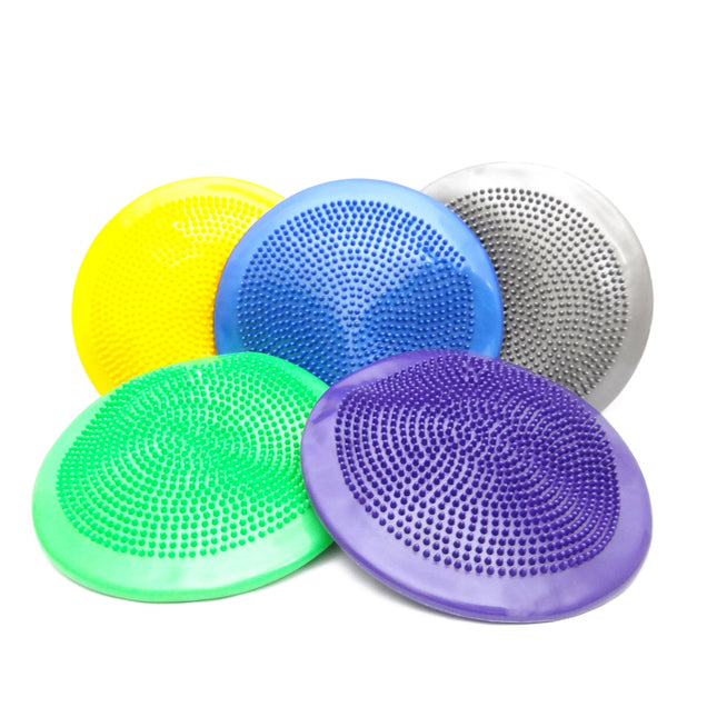 A collection of inflatable air cushions in various solid colors, each covered with raised nodules for grip.
